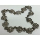 A stylish silver necklace with floral decoration. Approx. 56 grams.