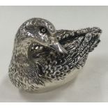 A heavy silver figure of a duck. Marked to side. Approx. 122 grams.