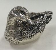 A heavy silver figure of a duck. Marked to side. Approx. 122 grams.