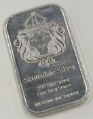 A 999 fine Scottsdale silver one troy ounce bar. Approx. 32 grams.