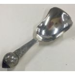 An Arts and Crafts silver and stone caddy spoon. Birmingham 1924.