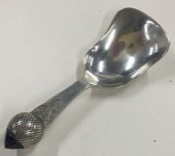 An Arts and Crafts silver and stone caddy spoon. Birmingham 1924.
