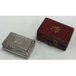 An unusual cased bright cut George III silver vinaigrette. Birmingham 1818.