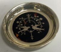 A fine silver and tortoiseshell inlaid silver coaster. London 1911. By William Comyns.