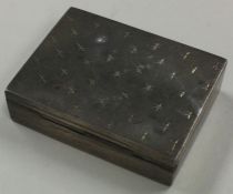 A large silver hinged box with engraved star decoration. Marked to base.
