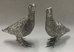 A fine pair of textured silver partridges. Approx.1022 grams.