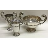 Three silver trophy cups. Various dates and makers. Approx. 257 grams.