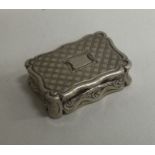 A George III silver vinaigrette with bright cut decoration to lid. Birmingham 1818.