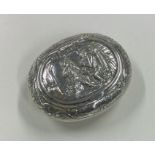 A chased silver box embossed with a tavern scene. Approx. 46 grams.