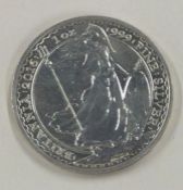 A fine 999 silver Britannia 2 Pounds coin. Approx. 30 grams.