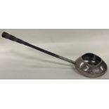 STUART DEVLIN: A fine and rare silver ladle with wooden handle. London 1973.