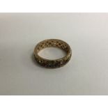 A 9 carat full eternity ring. Approx. 3 grams.