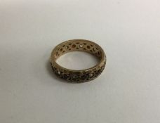 A 9 carat full eternity ring. Approx. 3 grams.