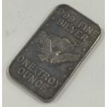 A 999 silver one troy ounce bar. Approx. 32 grams.