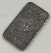 A 999 silver one troy ounce bar. Approx. 32 grams.