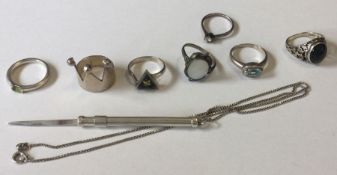 A collection of silver mounted rings together with a toothpick. Approx. 31 grams.