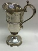 A silver jug to commemorate the 50th Anniversary of the sailing of the Mayflower.