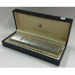 DUNHILL: A rare cased silver flask. Approx. 215 grams.
