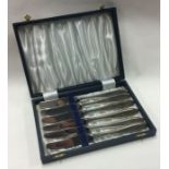 A set of six Norwegian silver cased table knives bearing import marks,