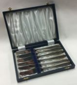 A set of six Norwegian silver cased table knives bearing import marks,