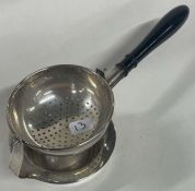 A good silver hinged tea strainer. Birmingham 1921. By MT&S. Approx. 65 grams.