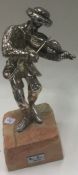 (94) A large Judaica silver figure of a man playin
