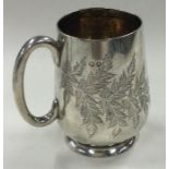 A Victorian silver christening mug engraved with bamboo design. London 1890.