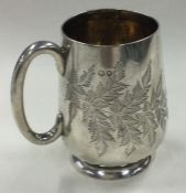 A Victorian silver christening mug engraved with bamboo design. London 1890.