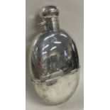 A fine and large silver flask. Sheffield 1922. By Walker & Hall. Approx. 256 grams.