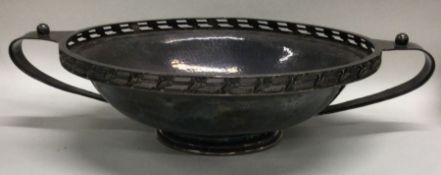 A E JONES: An Arts and Crafts silver pierced bowl.