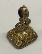 A good chased seal with floral decoration. Approx. 8 grams.