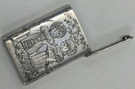 SAMPSON MORDAN: A silver vesta case engraved with a Kate Greenway design.