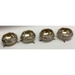 A set of four Victorian silver salts with chased decoration. Birmingham.