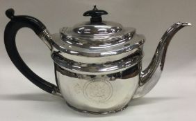 A George III silver teapot. London 1802. By Solomon Hougham.