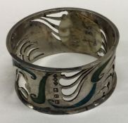 LIBERTY & CO: A Victorian silver and enamelled napkin ring.