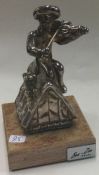 (95) A large Judaica silver figure of a man playin