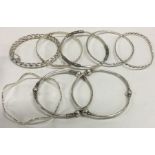 Eight silver bangles. Approx. 86 grams.