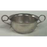 An early 18th Century silver two handled toy porringer. London 1704. By J Cole.