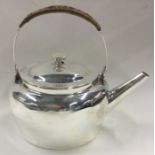 HUKIN & HEATH: A fine silver plated kettle. Designed by CHRISTOPHER DRESSER..