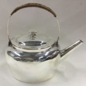 HUKIN & HEATH: A fine silver plated kettle. Designed by CHRISTOPHER DRESSER..