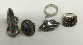 Six silver rings. Approx. 57 grams.