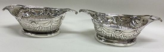 A heavy pair of Georgian style salts of half fluted design.