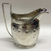 An 18th Century Georgian silver cream jug.