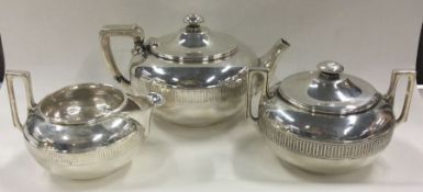 TIFFANY & CO: A 19th Century three piece silver tea service. New York.