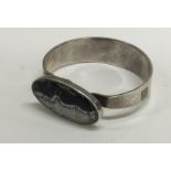 A contemporary heavy silver and stone bangle. London 2005.