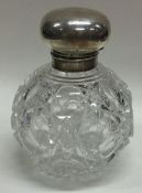 A large silver mounted glass perfume bottle. London 1903.