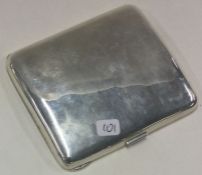 A rare silver cigarette case with enamelled decoration to interior.
