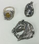 Two silver brooches together with a ring. Approx. 38 grams.