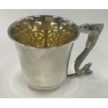 An unusual silver christening mug with cast fish handle. Birmingham 1972.