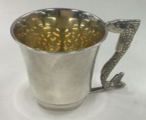An unusual silver christening mug with cast fish handle. Birmingham 1972.